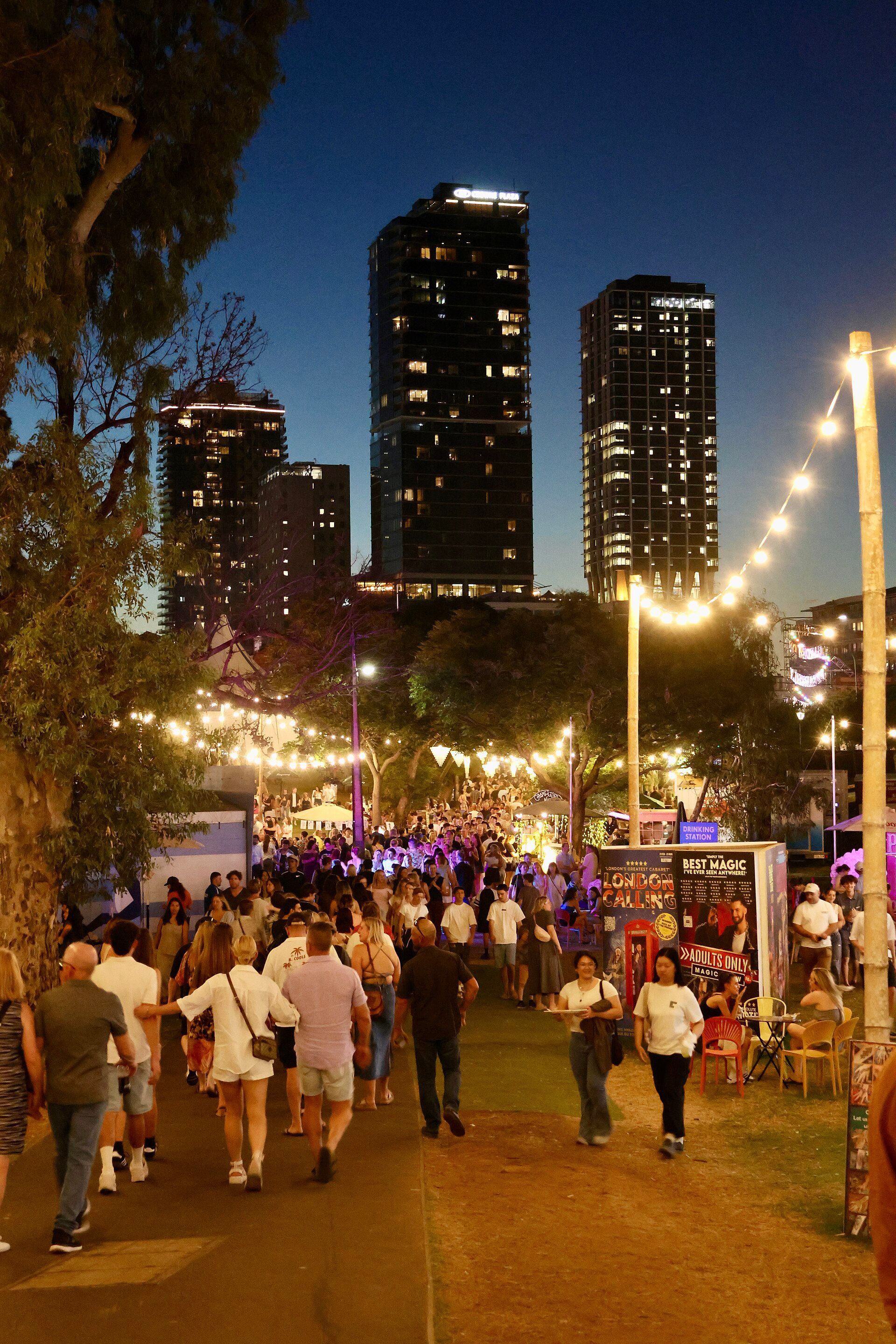 Illuminated festival walkway at Gluttony during Adelaide Fringe 2025