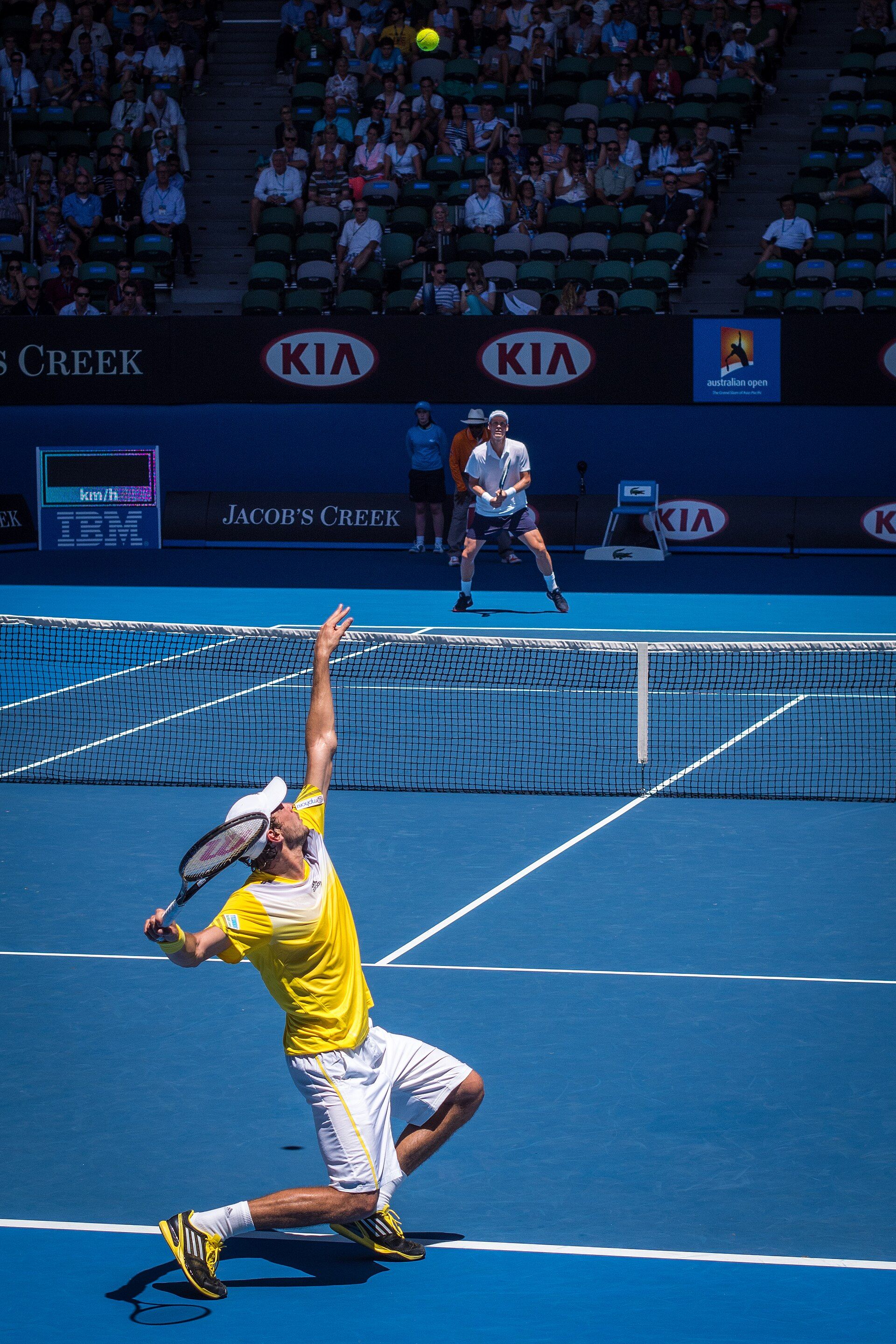 A player serving in Rod Laver Arena at the Australian Open