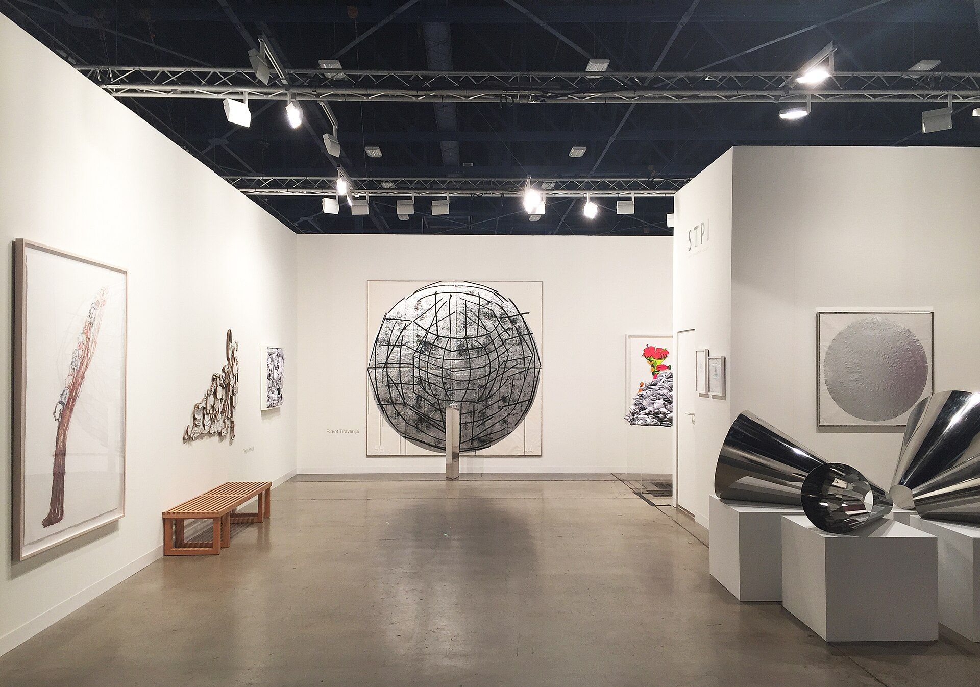 STPI gallery booth presenting contemporary artworks at Art Basel Miami Beach in 2014