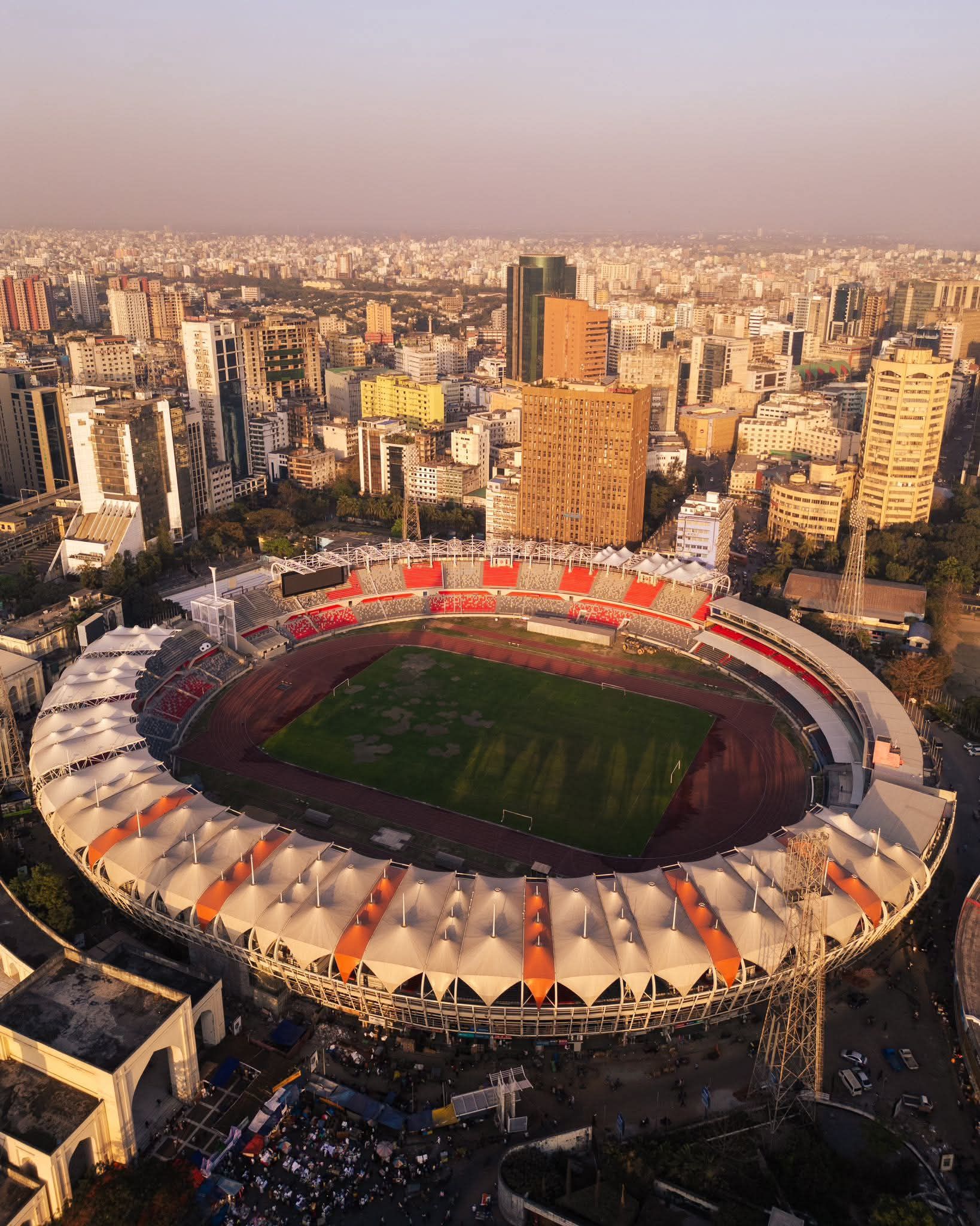 Aerial view of Bangladesh National Football Stadium and central Dhaka