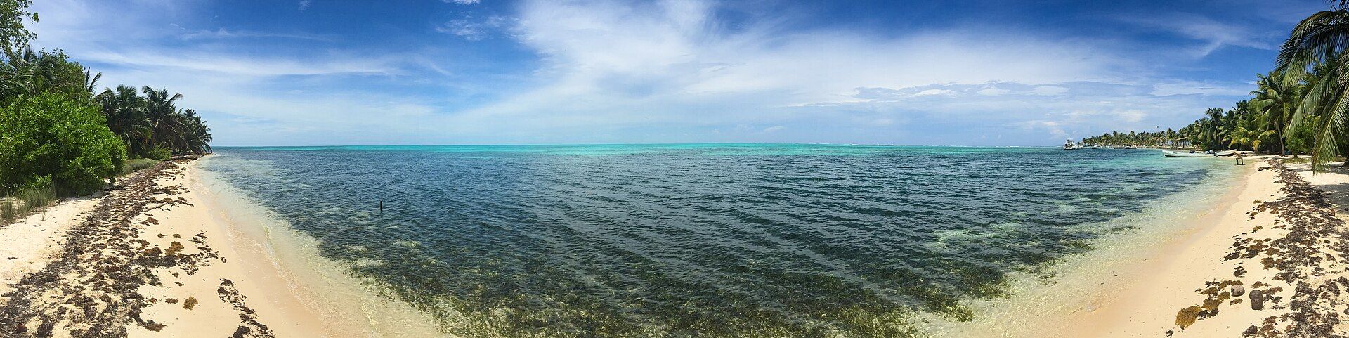 Aerial view of reefs and Caribbean water in Belize