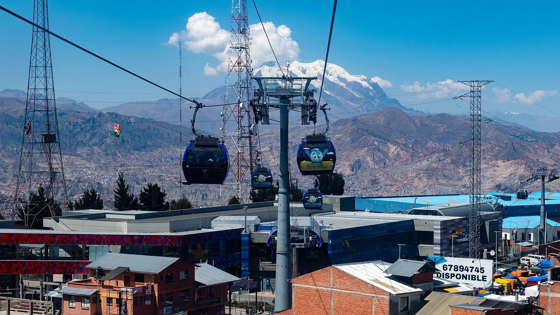 Mi Teleférico cable cars with Mount Illimani beyond
