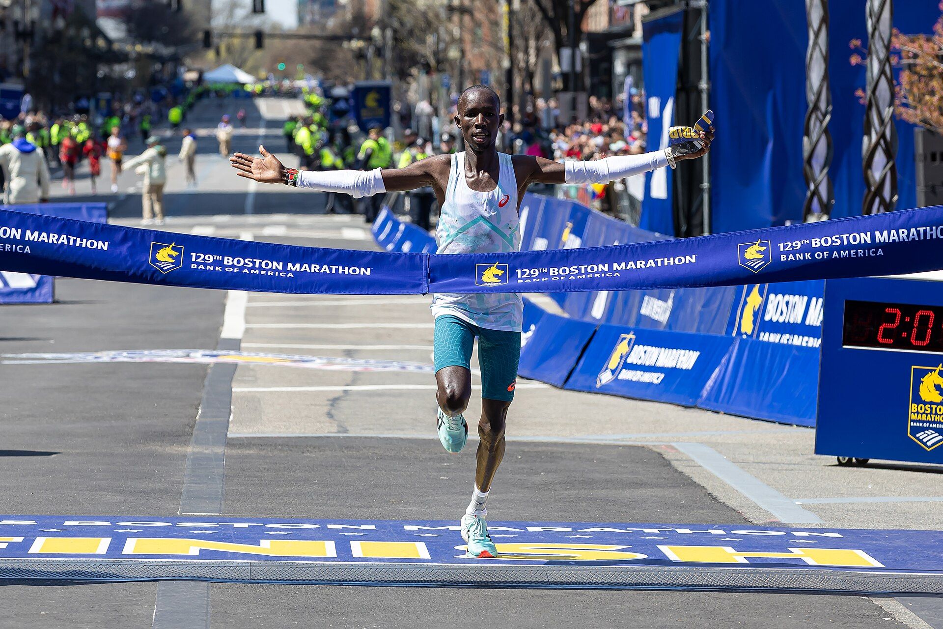 John Korir crossing the 2025 Boston Marathon finish