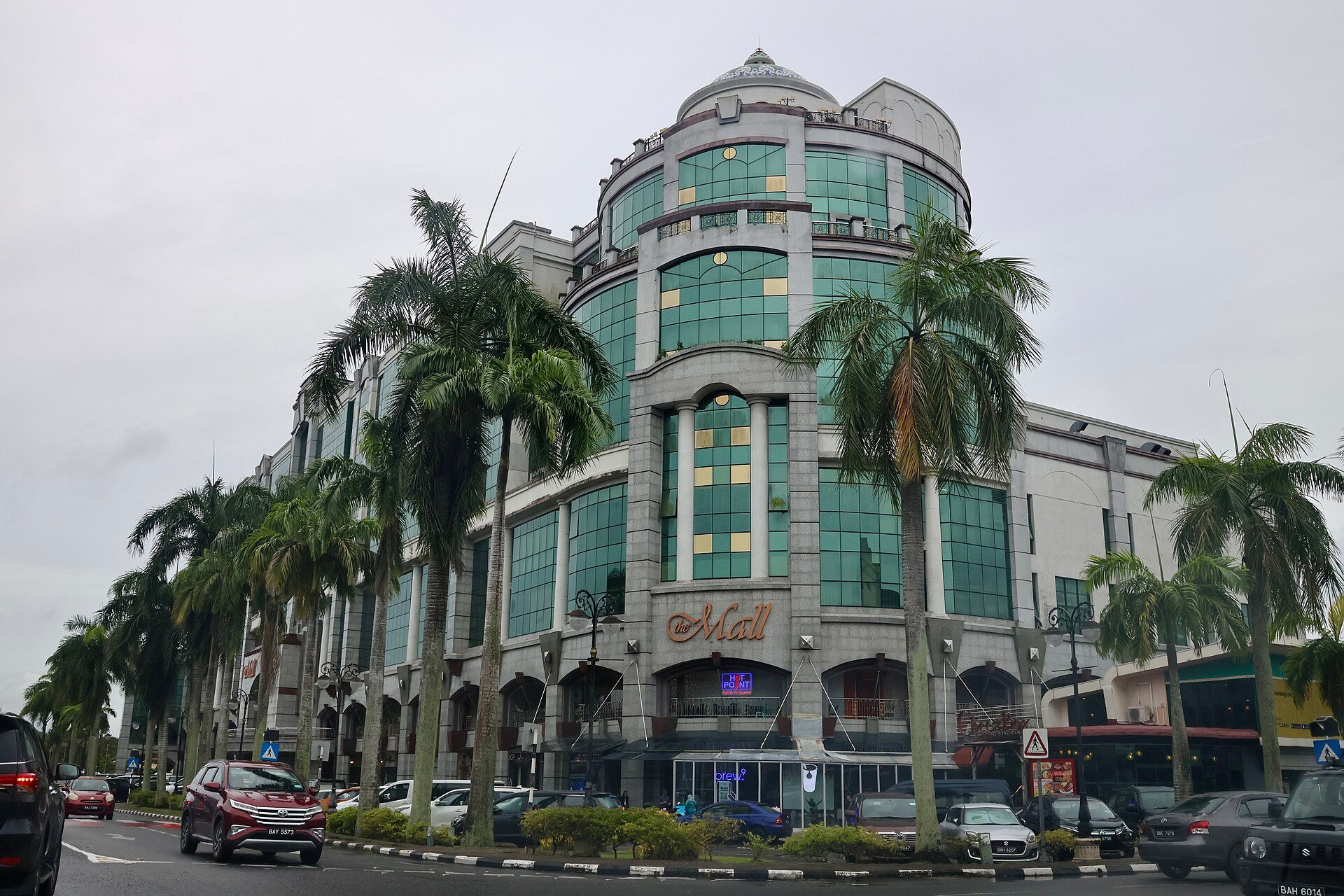 The Mall Gadong and its curved glass-fronted facade