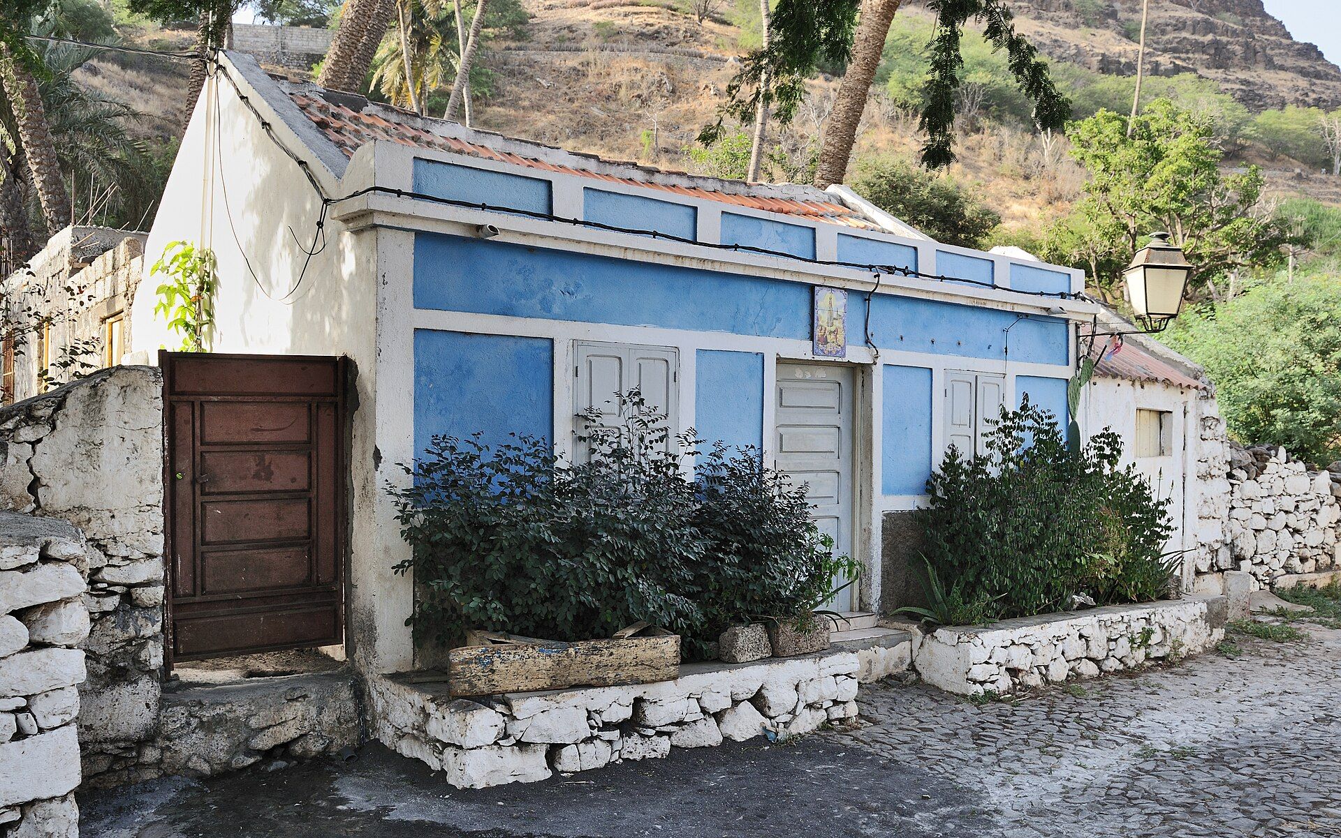White-and-blue house and stone lane in Cidade Velha