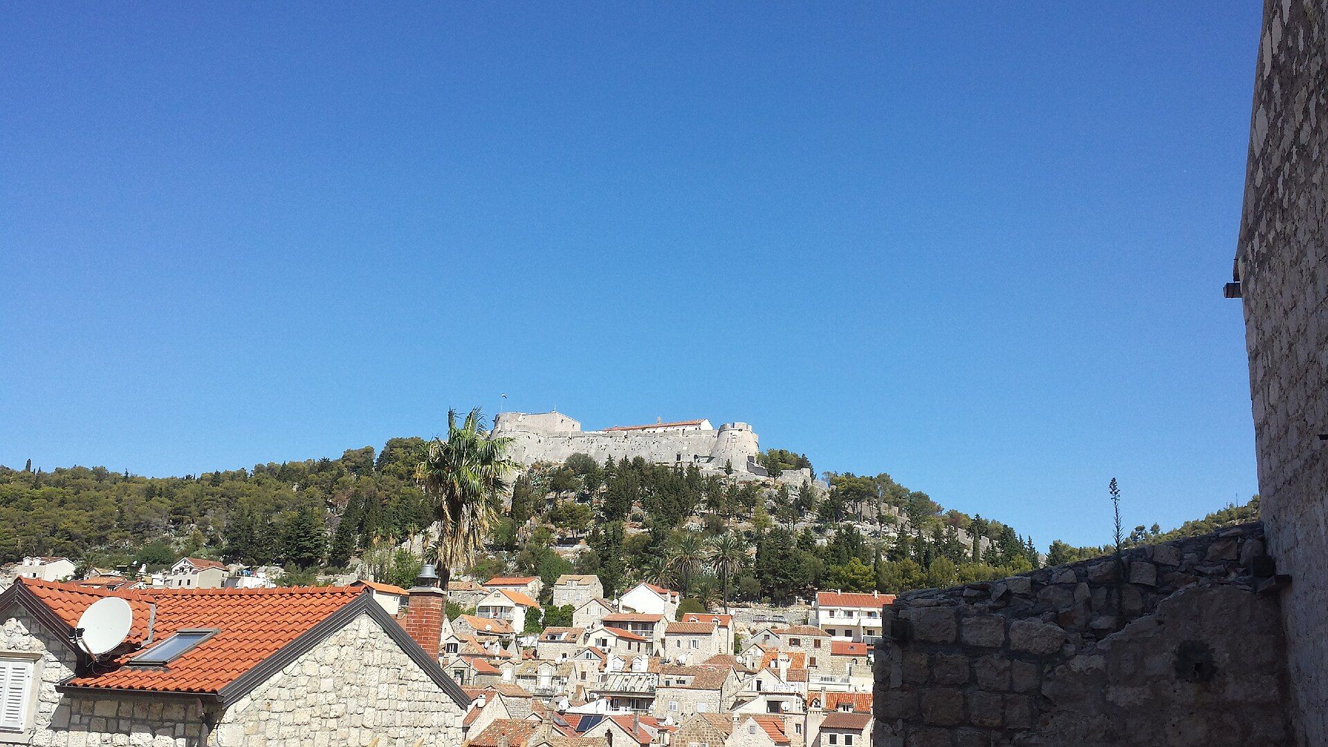 Authentic Hvar's steep historic houses and Fortica Fortress