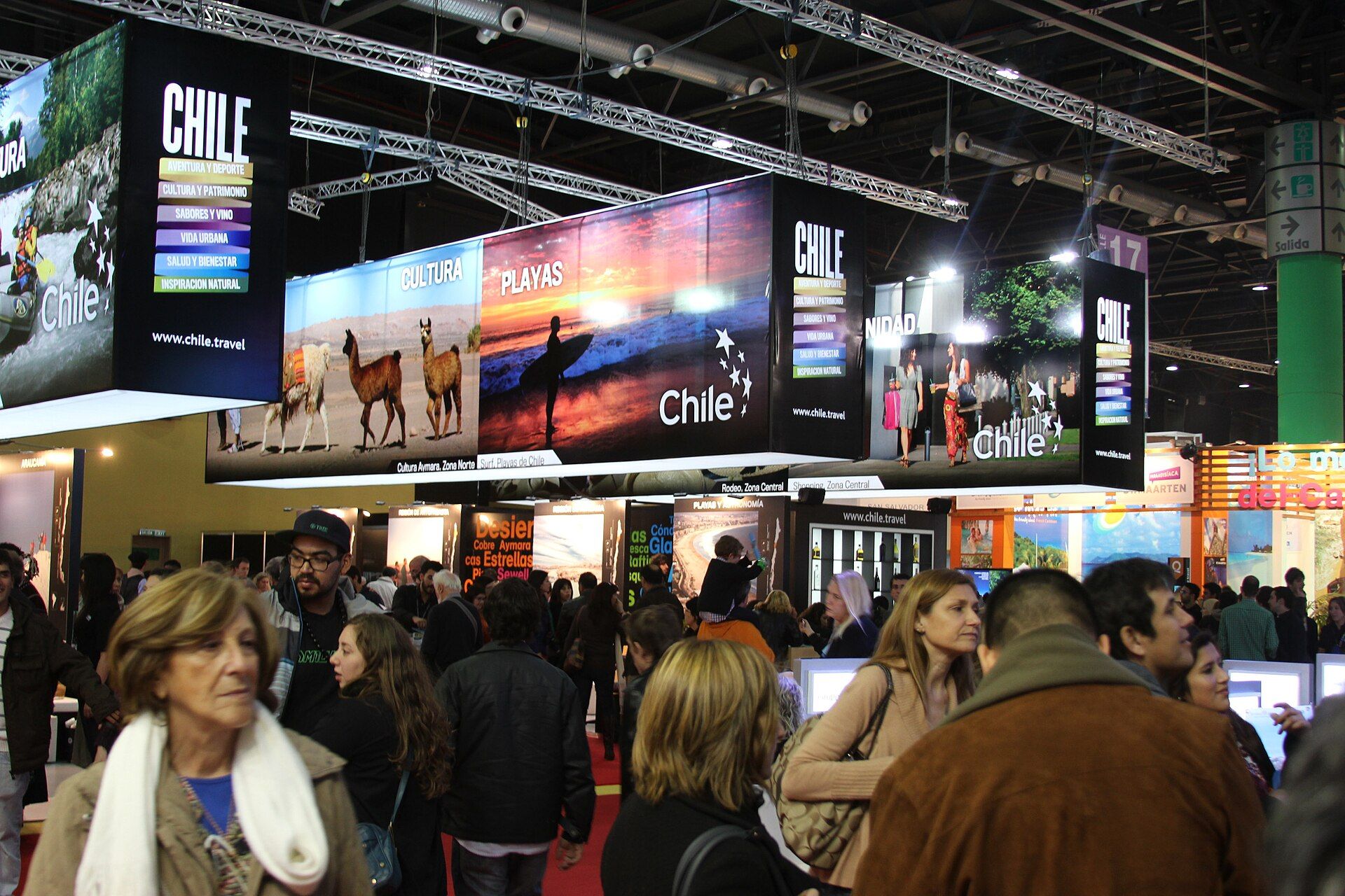 Visitors browsing international destination stands at FIT Argentina