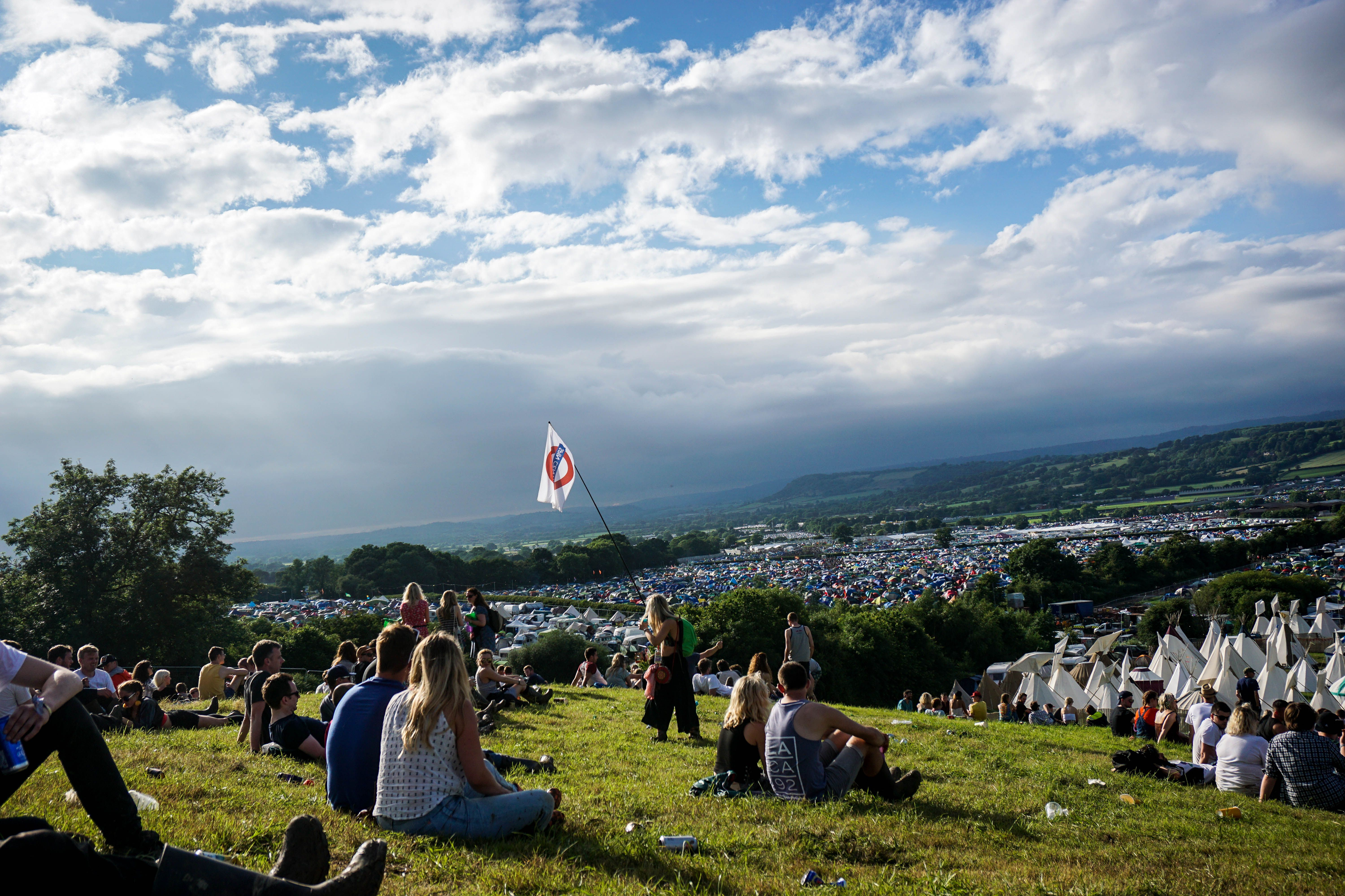 A crowd gathered at Glastonbury Festival 2016, shown as historical context.