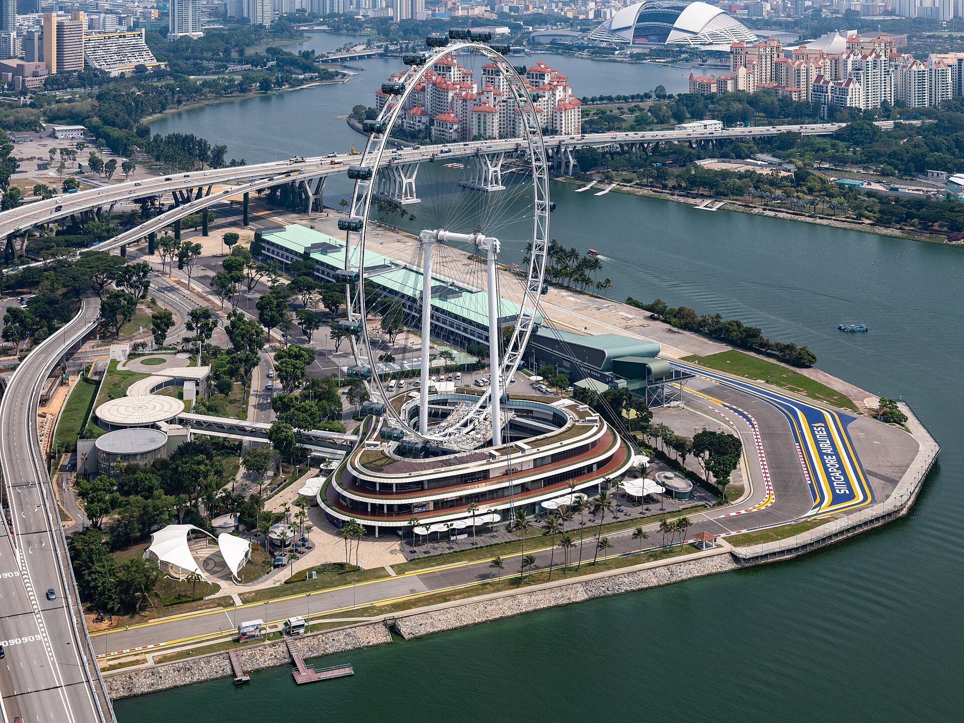 The Singapore Flyer seen from the Marina Bay Sands SkyPark (city context)