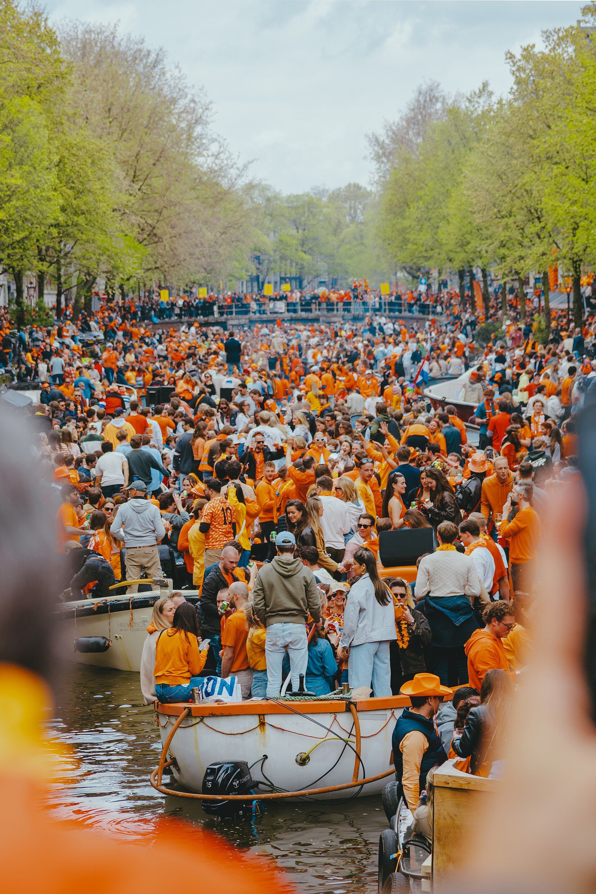 King's Day crowds on boats in Amsterdam