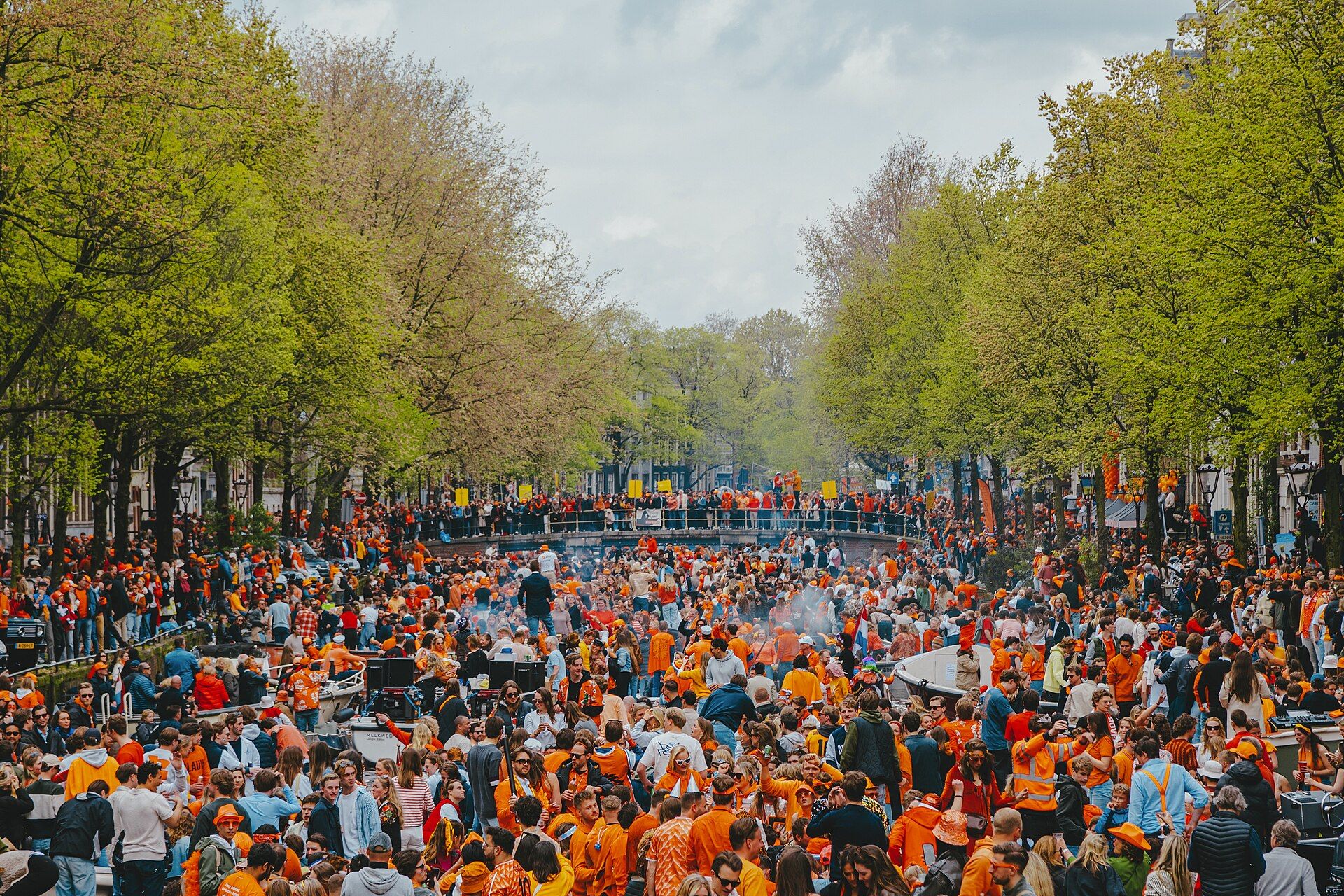 King's Day celebrations beside an Amsterdam canal
