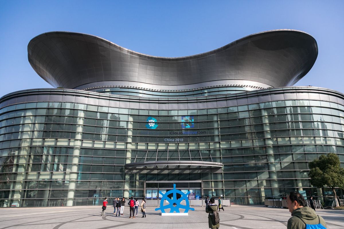 KubeCon and CloudNativeCon China branding outside the conference venue in 2018