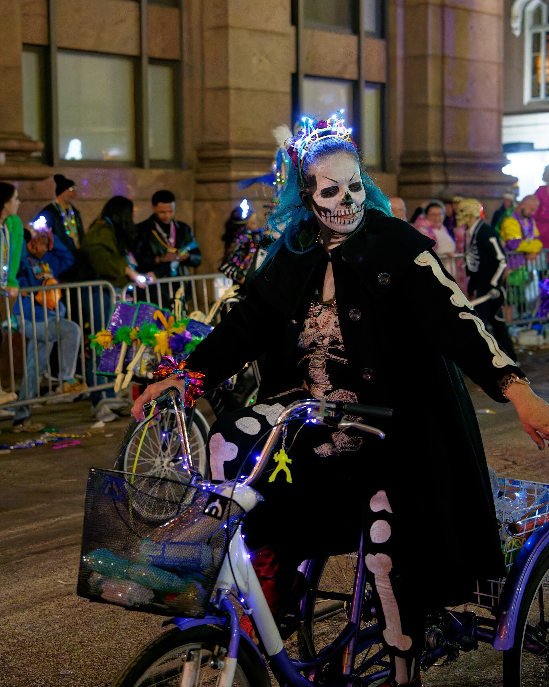 A costumed rider in the Krewe of Muses parade