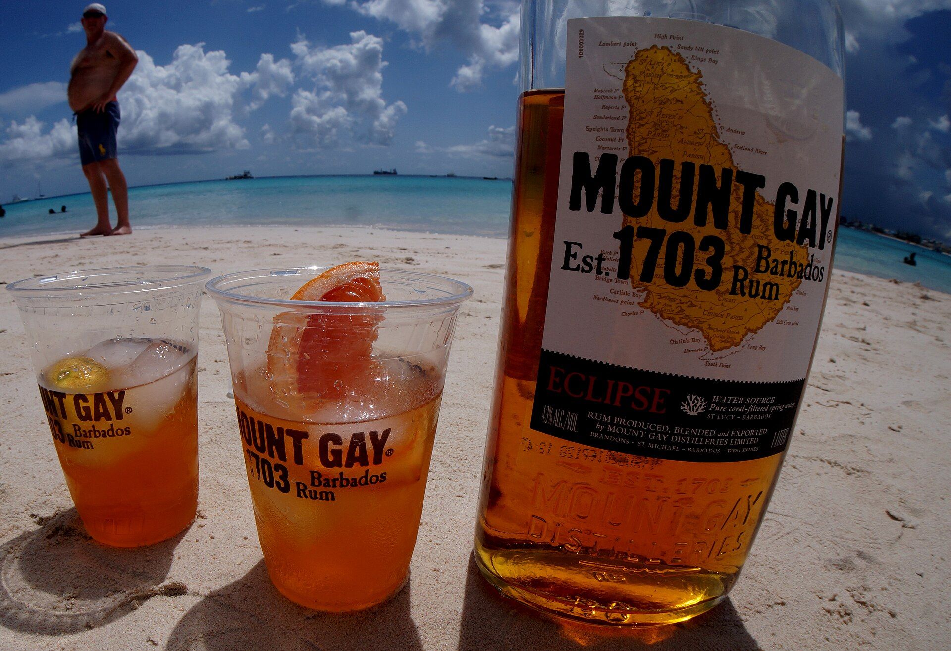 Mount Gay rum cocktails beside a Barbados beach