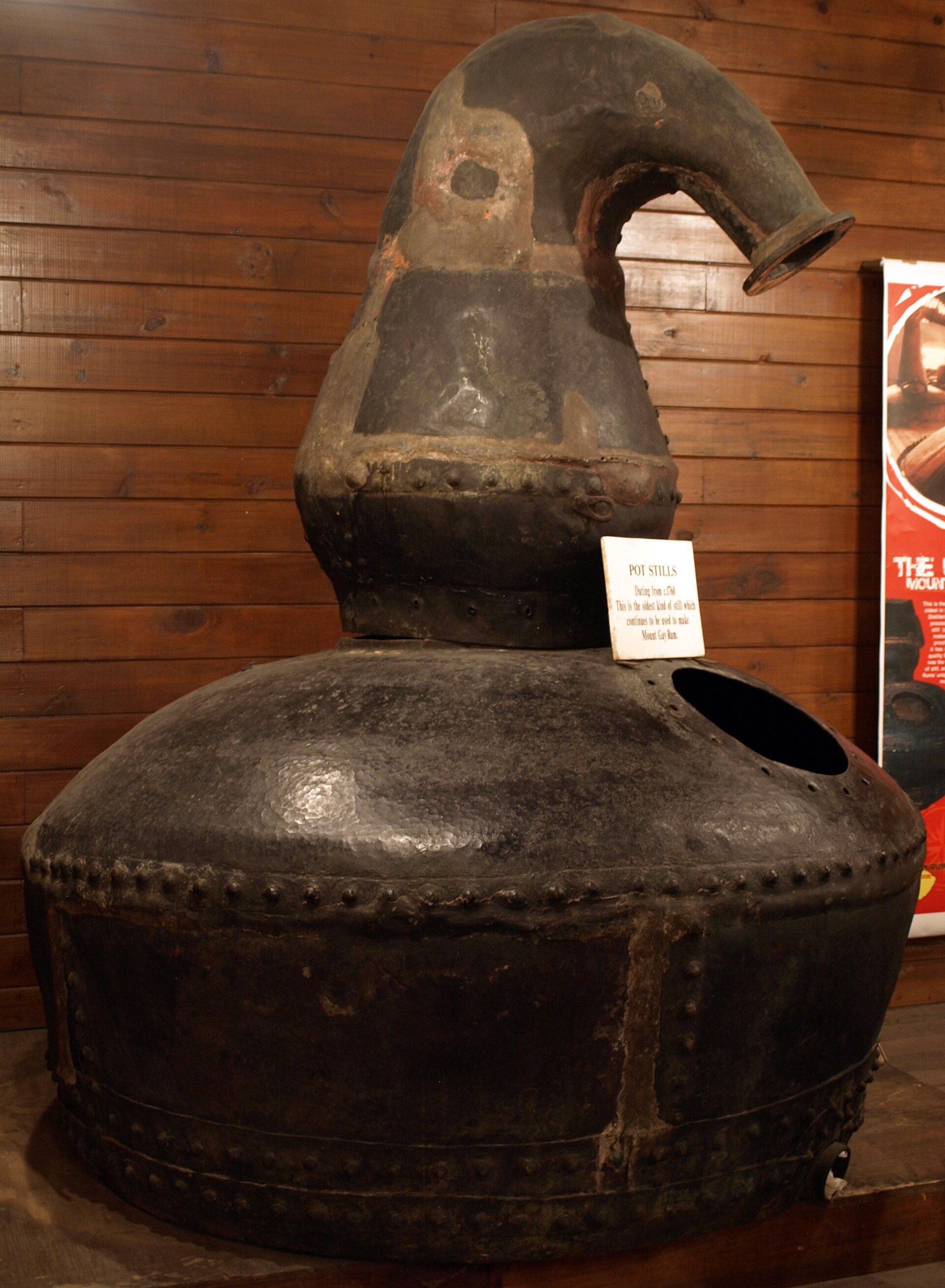 Historic pot still displayed at Mount Gay Rum Distillery