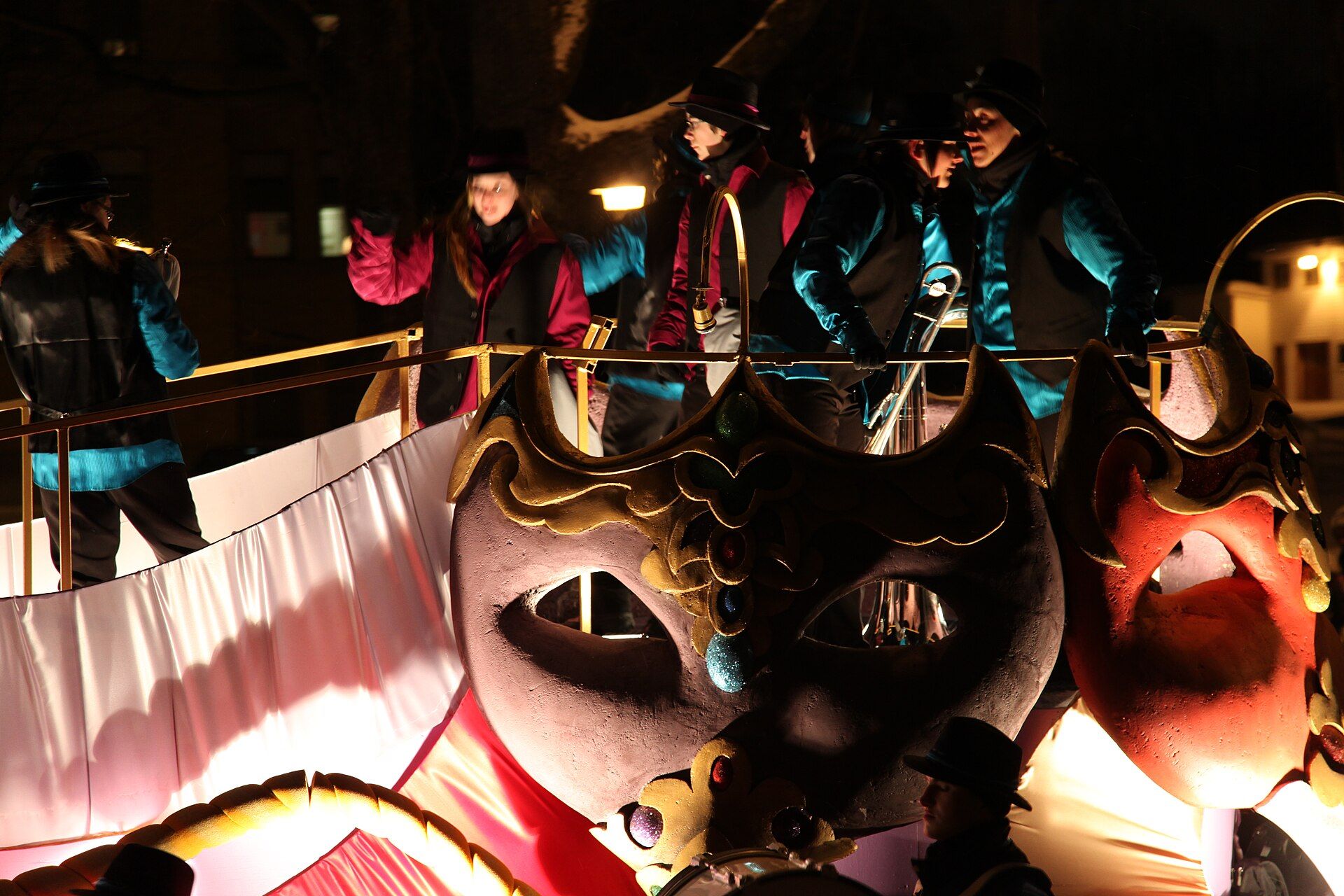 Illuminated snow structures at the Québec Winter Carnival after dark
