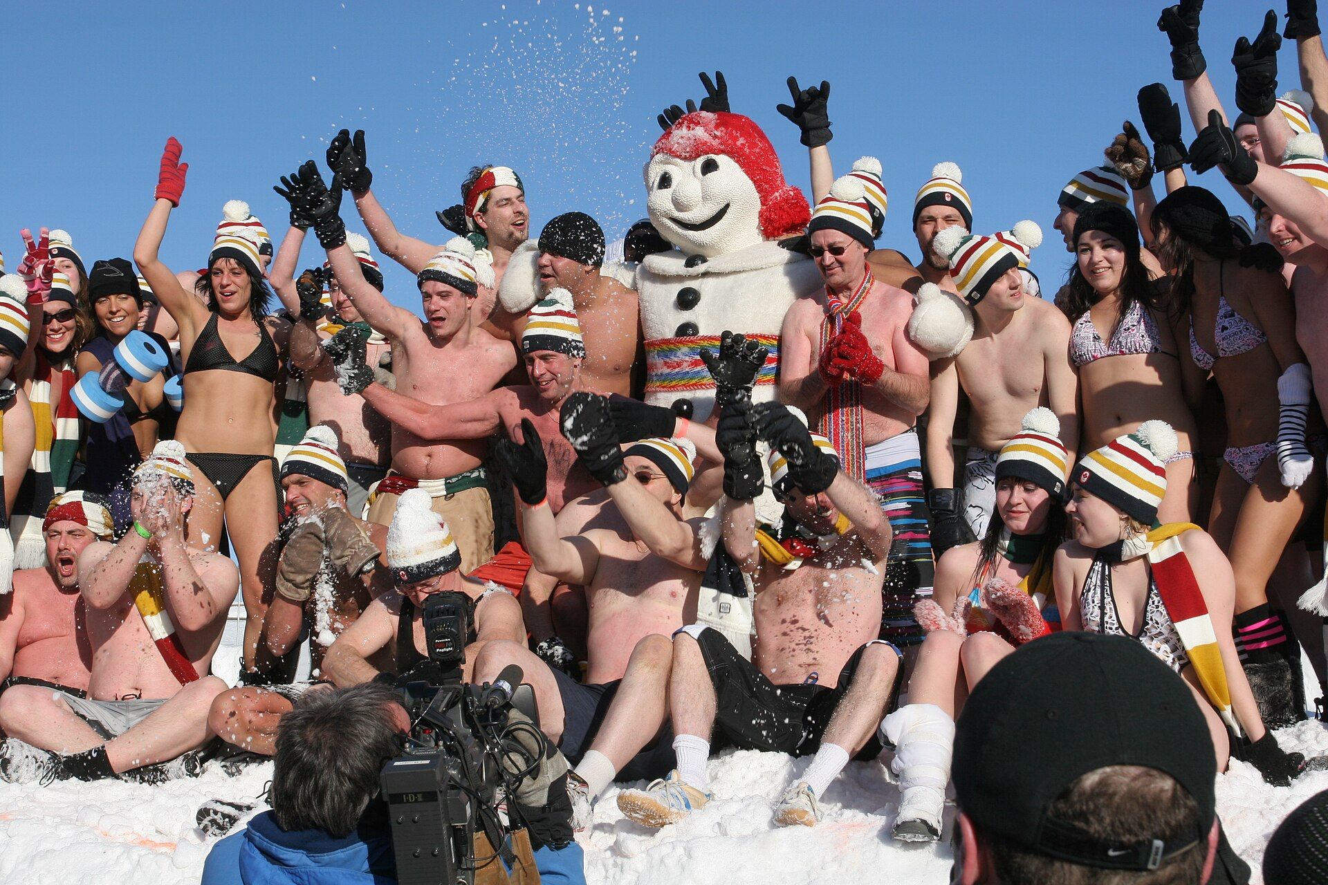 Participants in the traditional snow bath with Bonhomme Carnaval
