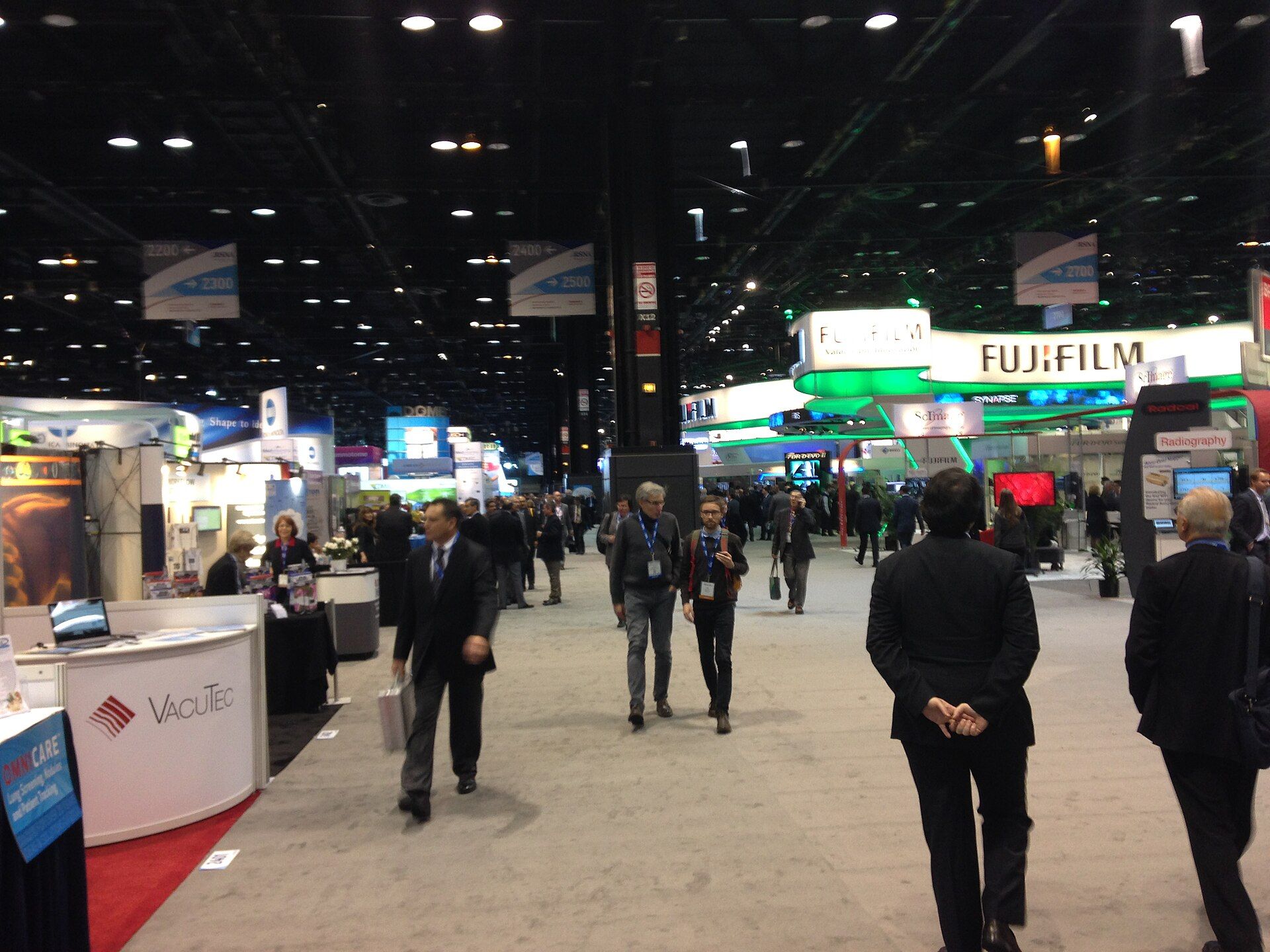 Medical-imaging exhibits and professional attendees on the RSNA 2014 show floor