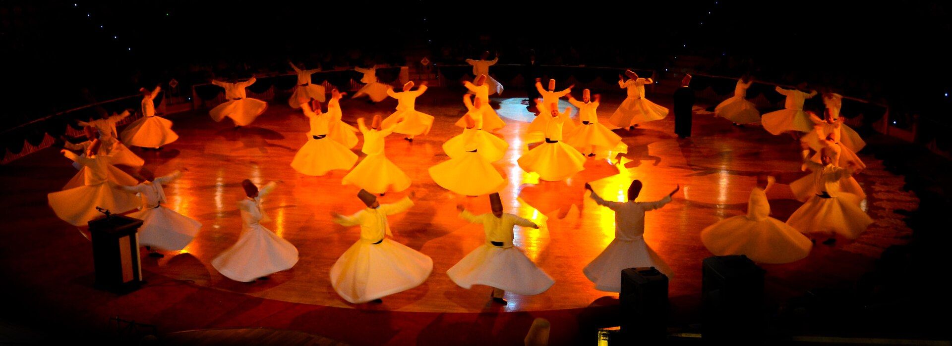 A line of semazens during a ceremony in Konya
