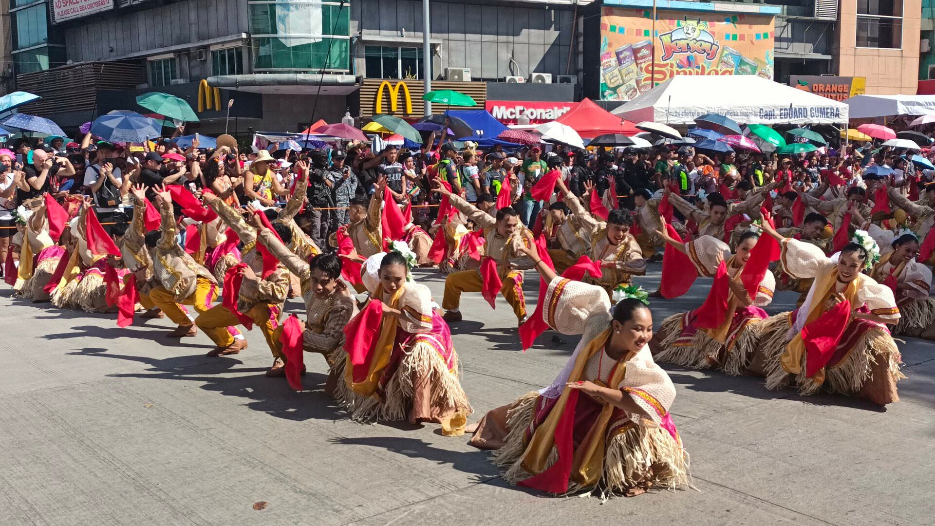 Street dancers passing Fuente Osmeña Circle during Sinulog
