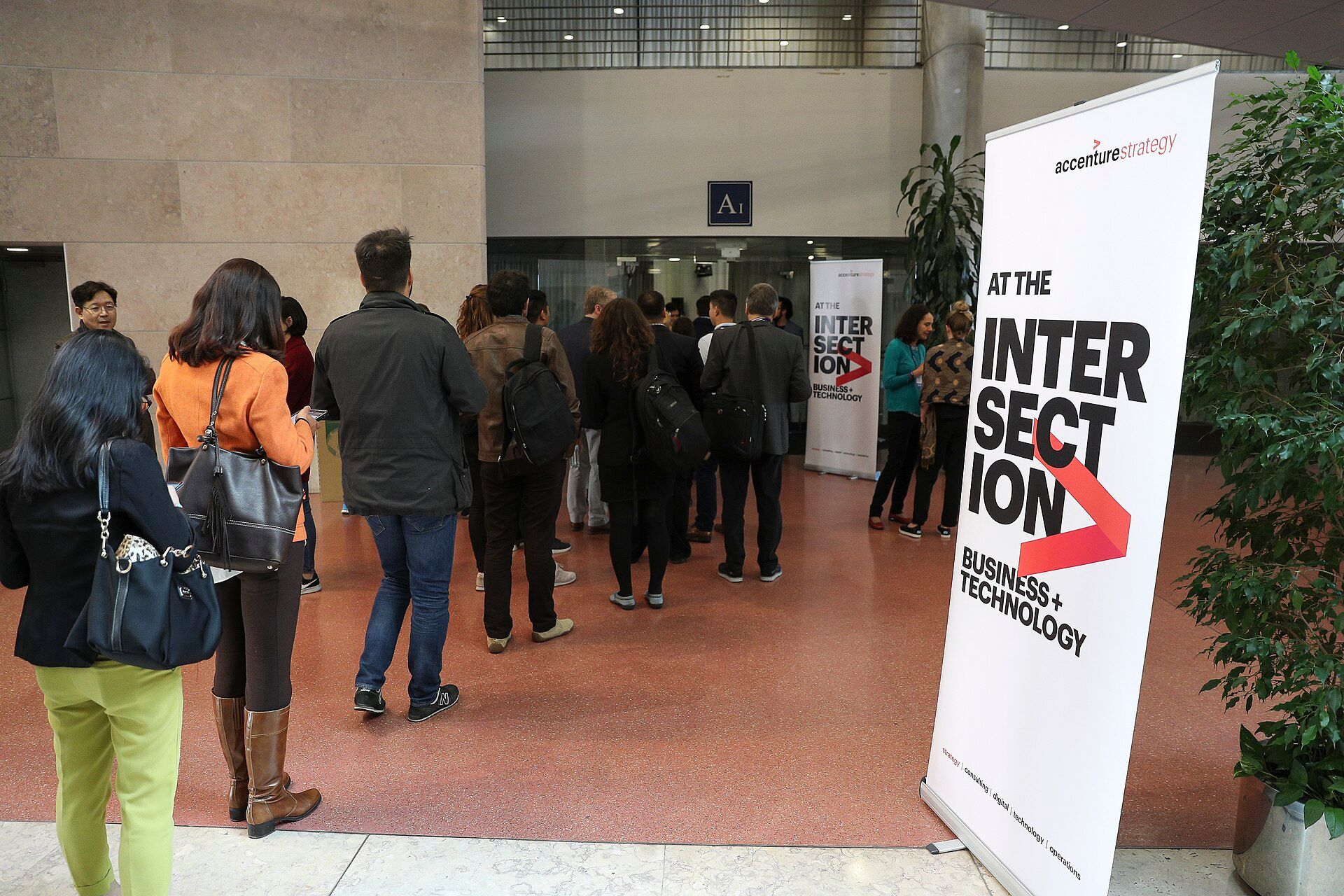 Attendees queuing for a Web Summit business and technology workshop